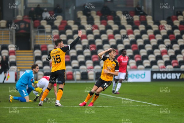 281120 - Newport County v Salford City - FA Cup Second Round - Jamie Proctor of Newport County and Scott Twine appeal for a penalty  
