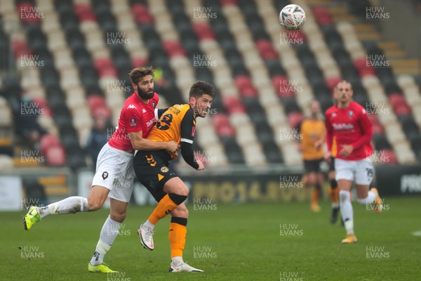 281120 - Newport County v Salford City - FA Cup Second Round - Jamie Proctor of Newport County under pressure from Jordan Turnbull of Salford City   