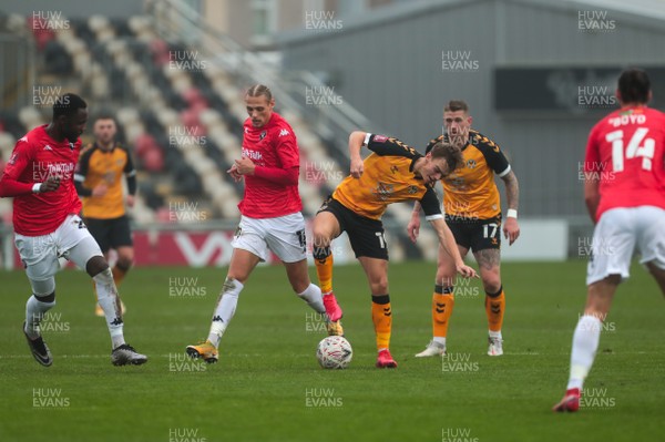 281120 - Newport County v Salford City - FA Cup Second Round - Scott Twine of Newport County tries to find a way past Jordan Turnbull of Salford City  