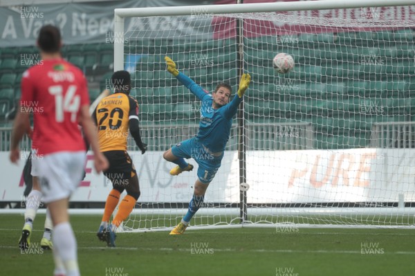 281120 - Newport County v Salford City - FA Cup Second Round - Vaclav Hladky Salford City Goalkeeper is beaten by Jamie Proctor of Newport County�s header  