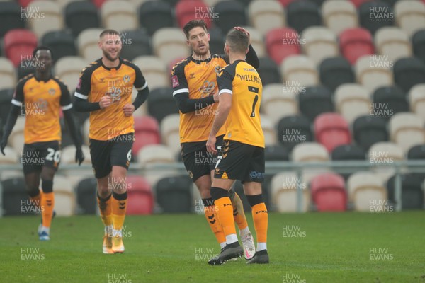 281120 - Newport County v Salford City - FA Cup Second Round - Jamie Proctor of Newport County celebrates scoring with Robbie Willmott   