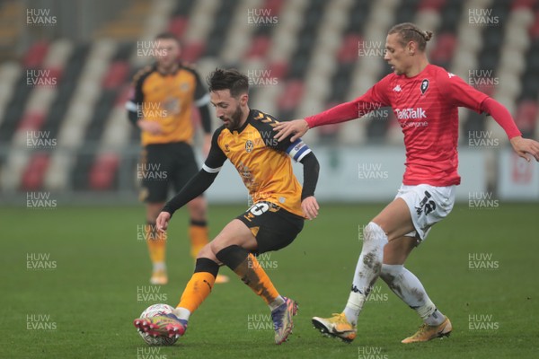 281120 - Newport County v Salford City - FA Cup Second Round - Josh Sheehan of Newport County with Oscar Threlkeld of Salford City   