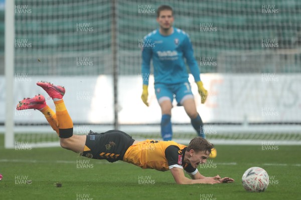 281120 - Newport County v Salford City - FA Cup Second Round -  Scott Twine of Newport County is brought down in the penalty area by Kevin Berkoe of Salford City   