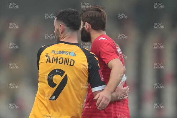 281120 - Newport County v Salford City - FA Cup Second Round - Padraig Amond of Newport County and Jordan Turnbull of Salford City at the final whistle  