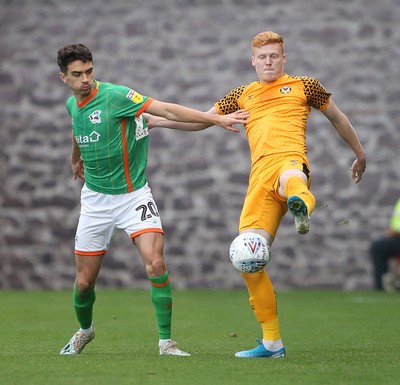 191019 - Newport County v Scunthorpe United - SkyBet League Two - Ryan Haynes of Newport County is challenged by Alex Gilliead of Scunthorpe United