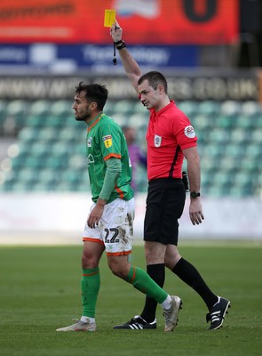 191019 - Newport County v Scunthorpe United - SkyBet League Two - Levi Sutton of Scunthorpe United is given a yellow card by referee Tom Nield