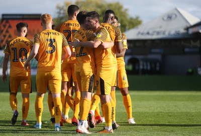 191019 - Newport County v Scunthorpe United - SkyBet League Two - Padraig Amond of Newport County celebrates scoring a goal with team mates