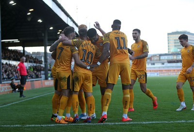 191019 - Newport County v Scunthorpe United - SkyBet League Two - Josh Sheehan of Newport County celebrates scoring a goal with team mates