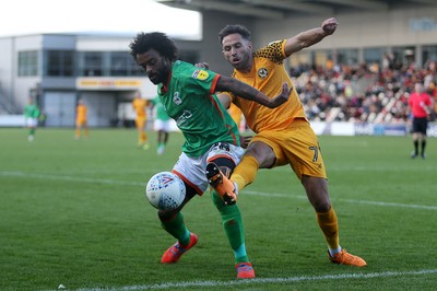 191019 - Newport County v Scunthorpe United - SkyBet League Two - Junior Brown of Scunthorpe United is challenged by Robbie Willmott of Newport County