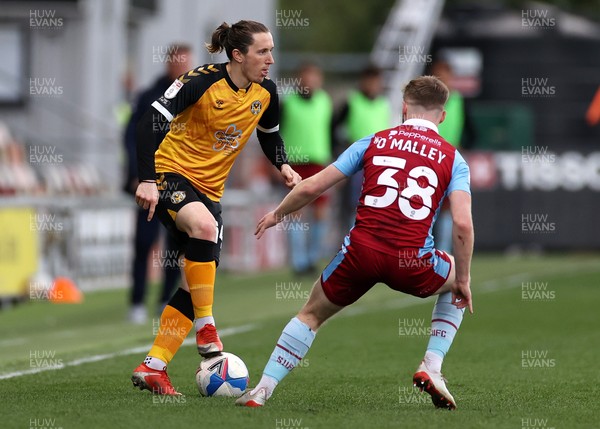 270421 - Newport County v Scunthorpe United - SkyBet League Two - Aaron Lewis of Newport County is challenged by Mason O'Malley of Scunthorpe