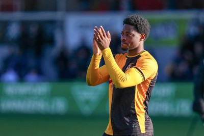 280326 - Newport County v Shrewsbury Town - Sky Bet League 2 - Bobby Kamwa of Newport County applauds the fans following the match