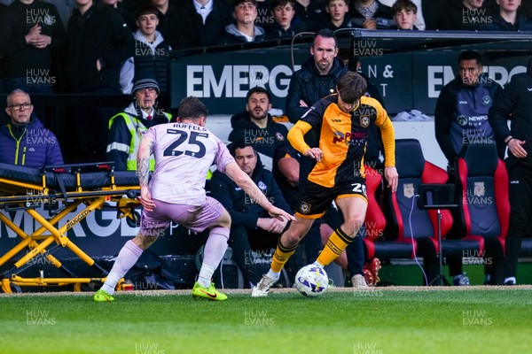 280326 - Newport County v Shrewsbury Town - Sky Bet League 2 - Ben Lloyd of Newport County takes on Josh Ruffels of Shrewsbury Town