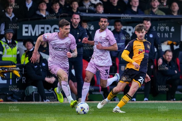 280326 - Newport County v Shrewsbury Town - Sky Bet League 2 - Ben Lloyd of Newport County passes the ball whilst under pressure