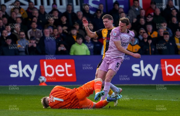 280326 - Newport County v Shrewsbury Town - Sky Bet League 2 - Matthew Cox of Shrewsbury Town gathers the ball from the feet of James Crole of Newport County and William Boyle of Shrewsbury Town
