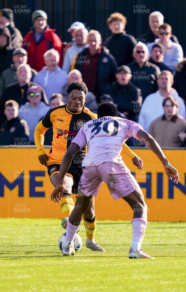 280326 - Newport County v Shrewsbury Town - Sky Bet League 2 - Bobby Kamwa of Newport County takes on  Kevin Berkoe of Shrewsbury Town