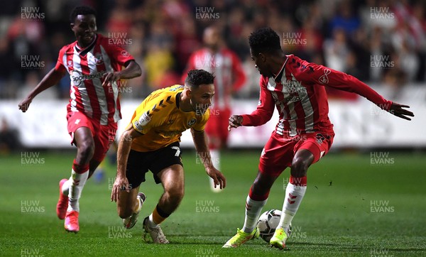 250821 - Newport County v Southampton - Carabao Cup - Robbie Willmott of Newport County takes on Nathan Tella and Kyle Walker-Peters of Southampton