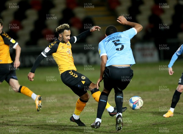 090221 - Newport County v Southend United, Sky Bet League 2 - Nicky Maynard of Newport County and Shaun Hobson of Southend United compete for the ball