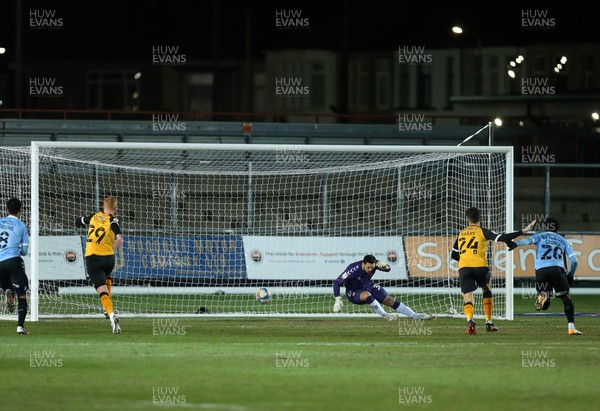 090221 - Newport County v Southend United, Sky Bet League 2 - Tom Clifford of Southend United beats Newport County goalkeeper Nick Townsend with a free kick to score a goal