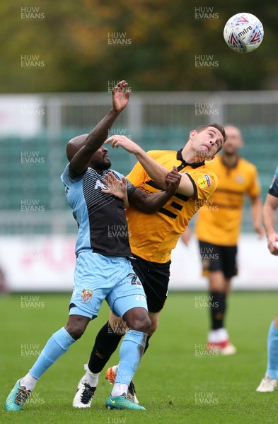 131018 - Newport County v Stevenage - SkyBet League Two - Matthew Dolan of Newport is tackled by 	Jamal Campbell-Ryce of Stevenage