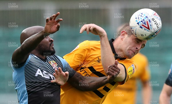 131018 - Newport County v Stevenage - SkyBet League Two - Matthew Dolan of Newport is tackled by 	Jamal Campbell-Ryce of Stevenage