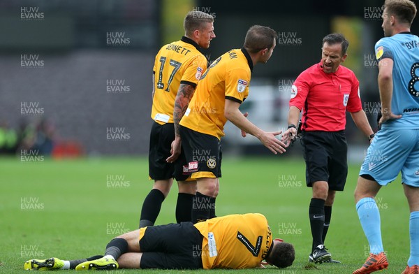 131018 - Newport County v Stevenage - SkyBet League Two - Robbie Willmott of Newport is taken off injured