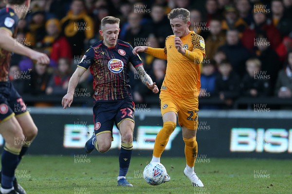 141219 - Newport County v Stevenage - SkyBet League Two - Taylor Maloney of Newport County is challenged by Charlie Lakin of Stevenage