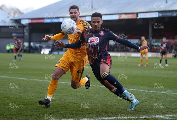 141219 - Newport County v Stevenage - SkyBet League Two - Tyler Denton of Stevenage is challenged by Padraig Amond of Newport County