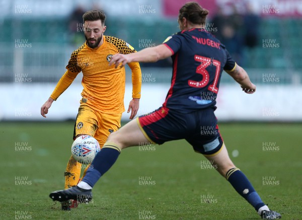 141219 - Newport County v Stevenage - SkyBet League Two - Josh Sheehan of Newport County is challenged by Ben Nugent of Stevenage