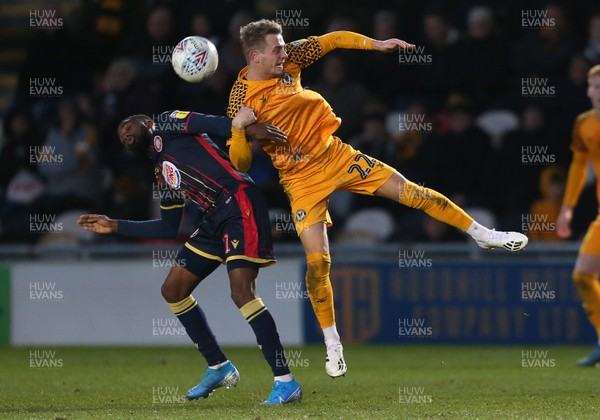 141219 - Newport County v Stevenage - SkyBet League Two - Taylor Maloney of Newport County is challenged by Emmanuel Sonupe of Stevenage