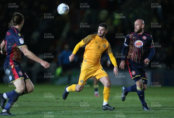 141219 - Newport County v Stevenage - SkyBet League Two - Padraig Amond of Newport County is challenged by Scott Cuthbert of Stevenage