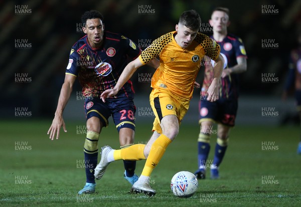 141219 - Newport County v Stevenage - SkyBet League Two - Lewis Collins of Newport County is challenged by Kurtis Guthrie of Stevenage
