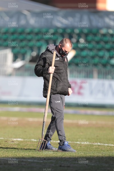 270221 - Newport County v Stevenage - Sky Bet League 2 - Ground staff at Rodney Parade tend to the pitch before kick off