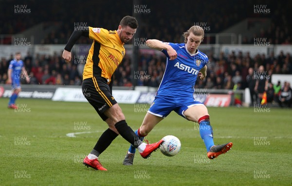 070418 - Newport County v Stevenage FC - SkyBet League Two - Padraig Amond of Newport County is tackled by Ben Sheaf of Stevenage