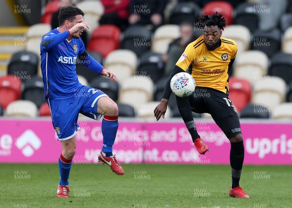 070418 - Newport County v Stevenage FC - SkyBet League Two - Marlon Jackson of Newport County is challenged by Ron Henry of Stevenage