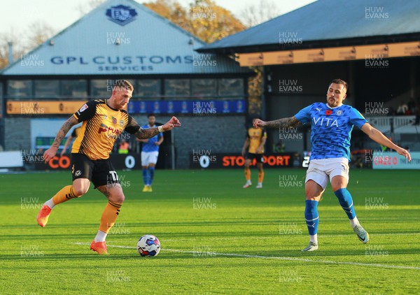 121122 - Newport County v Stockport County - Sky Bet League 2 -Scot Bennett of Newport takes on Antoni Sarcevic of Stockport