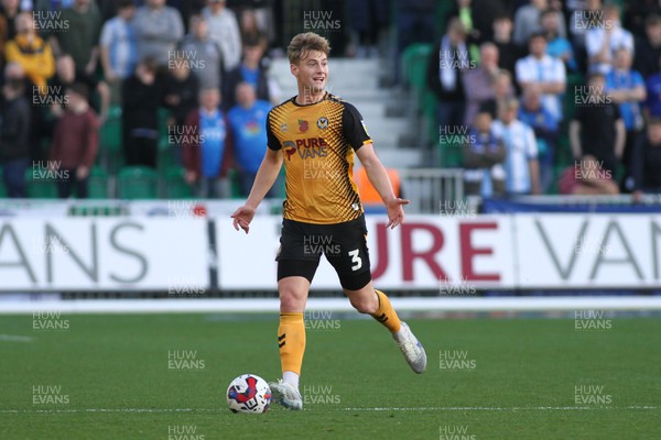 121122 - Newport County v Stockport County - Sky Bet League 2 - Declan Drysdale of Newport looks for support