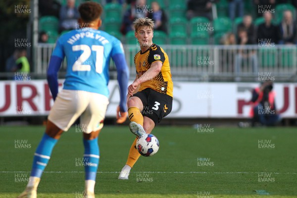 121122 - Newport County v Stockport County - Sky Bet League 2 - Declan Drysdale of Newport slides a pass along the floor 