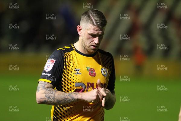 121122 - Newport County v Stockport County - Sky Bet League 2 - Scot Bennett of Newport leaves the field dejected at the end of the game