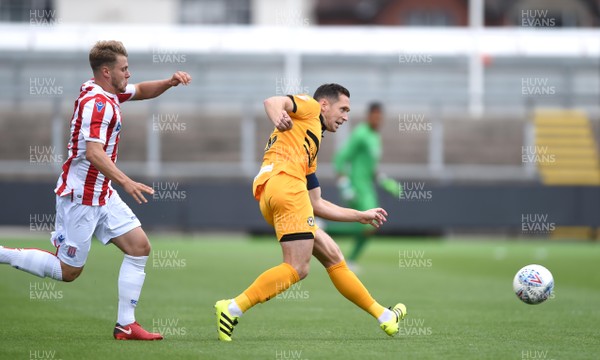 280718 - Newport County v Stoke City Under 23s - Preseason Friendly - Andrew Crofts of Newport County gets the ball away