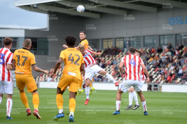 280718 - Newport County v Stoke City Under 23s - Preseason Friendly - Andrew Crofts of Newport County heads a shot at goal