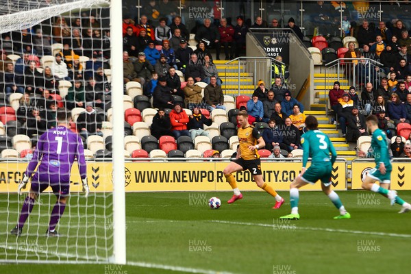 250223 - Newport County v Sutton United - Sky Bet League 2 - Cameron Norman of Newport County looks to cross the ball