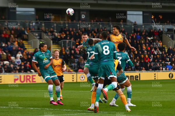 250223 - Newport County v Sutton United - Sky Bet League 2 - Priestley Farquharson of Newport County is unable to direct his header on target