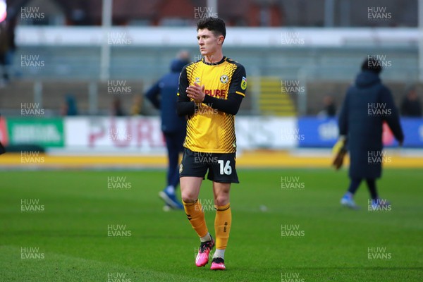 250223 - Newport County v Sutton United - Sky Bet League 2 - Calum Kavanagh of Newport County is dejected at he end of the game