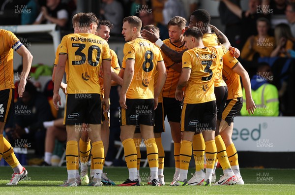 260823 - Newport County v Sutton United - SkyBet League Two - Harry Charsley of Newport County celebrates scoring a goal with team mates