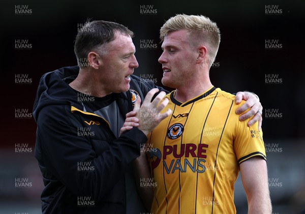 260823 - Newport County v Sutton United - SkyBet League Two - Newport County Manager Graham Coughlan with goal scorer Will Evans at full time