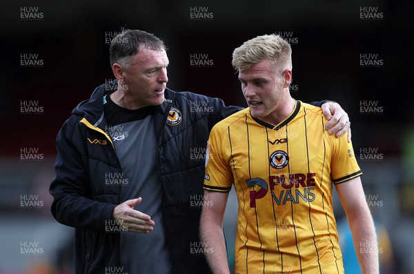 260823 - Newport County v Sutton United - SkyBet League Two - Newport County Manager Graham Coughlan with goal scorer Will Evans at full time