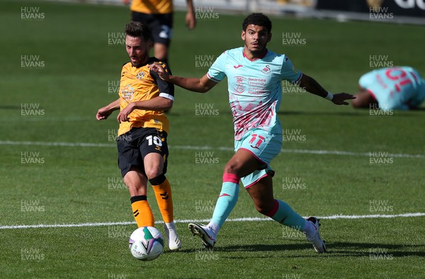 050920 - Newport County v Swansea City - Carabao Cup - Josh Sheehan of Newport County is challenged by Morgan Gibbs-White of Swansea City