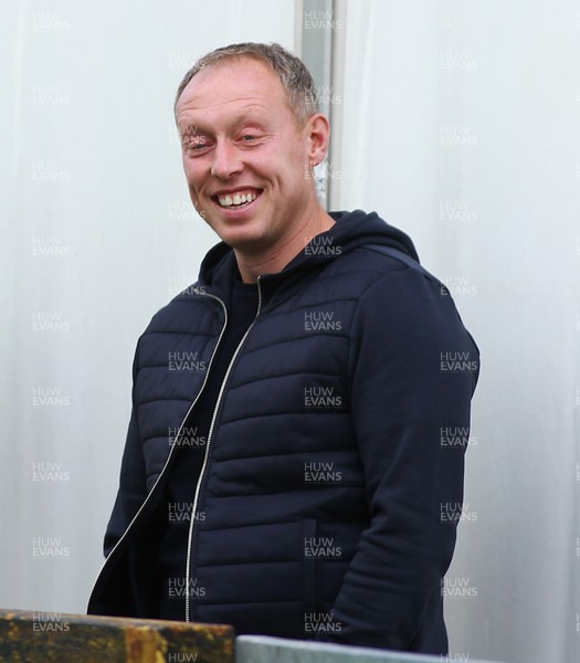 050920 - Newport County vs Swansea City - EFL Carabao Cup - Round 1 -  Manager of Swansea City Steve Cooper relaxes with his staff before kick off