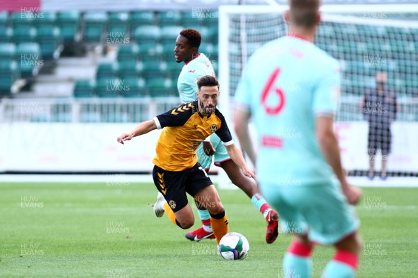 050920 - Newport County vs Swansea City - EFL Carabao Cup - Round 1 -  Josh Sheehan of Newport County escapes the challenge of Jamal Lowe of Swansea City