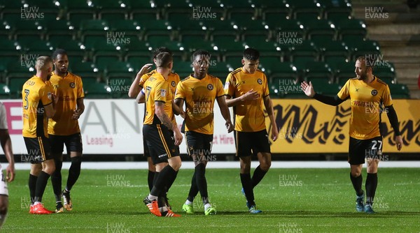 101017 - Newport County v Swansea City U23s - Checkatrade Trophy - Shawn McCoulsky of Newport County celebrates scoring a goal with team mates